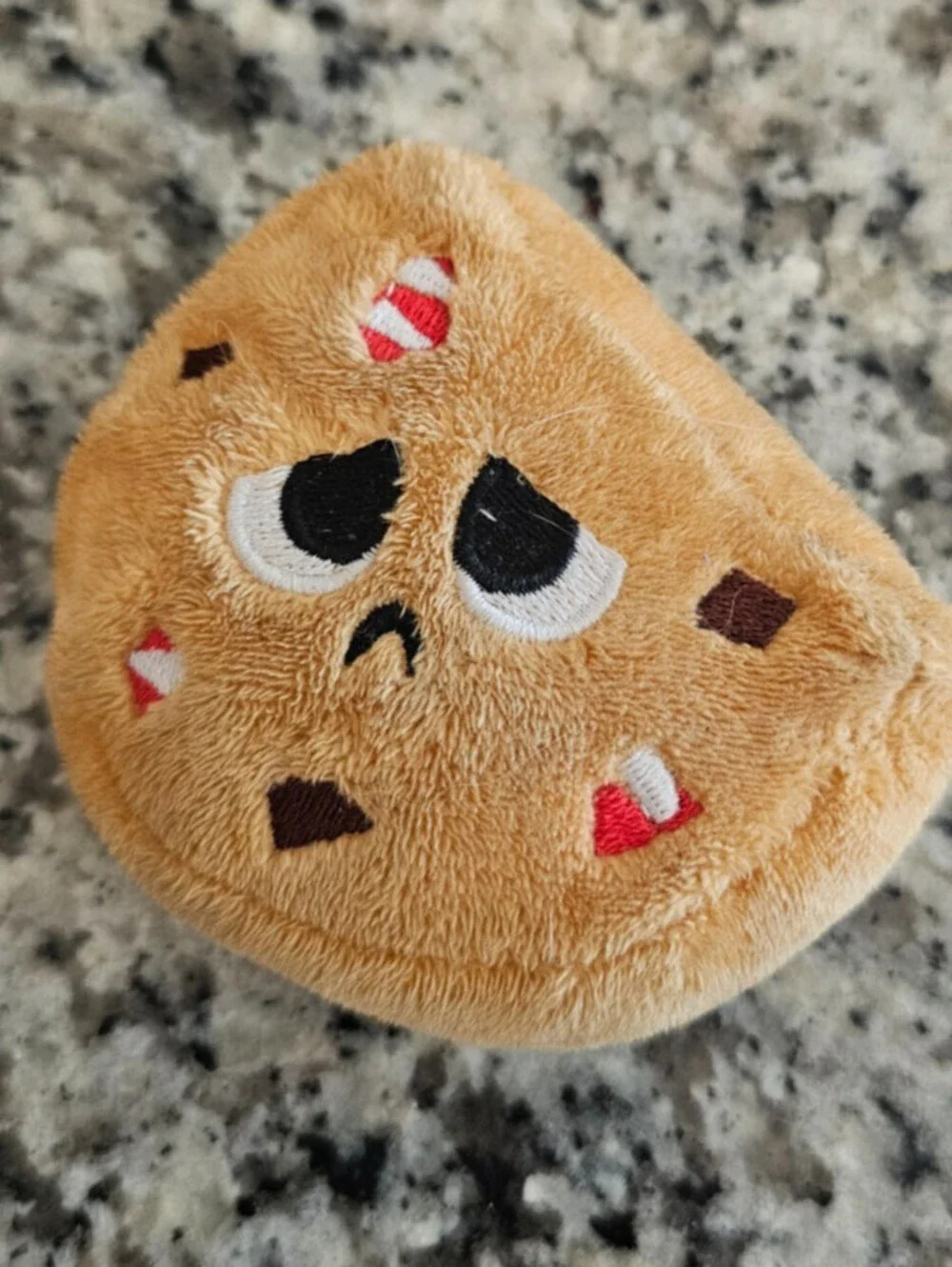 BarkBox plush dog toy sad embroidered face on a triangle-shaped cookie XS/S